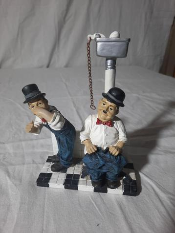 Laurel en Hardy , op het toilet beschikbaar voor biedingen