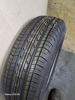 Nieuwe band met velg voor Mitsubischi Colt., Ophalen