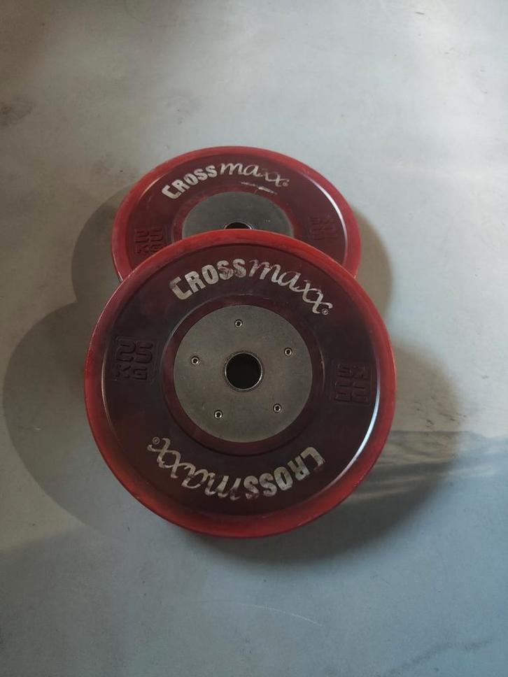 Rode Crossmaxx 25KG olympische bumperplates rood., Sport en Fitness, Fitnessmaterialen, Gebruikt, Halterschijven, Armen, Benen