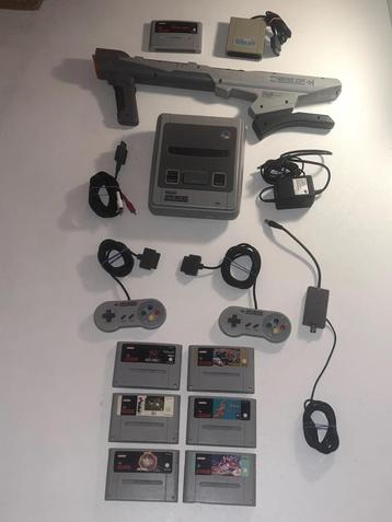 Super Nintendo incl. 7 games, Scope Gun en Gameboy Converter beschikbaar voor biedingen