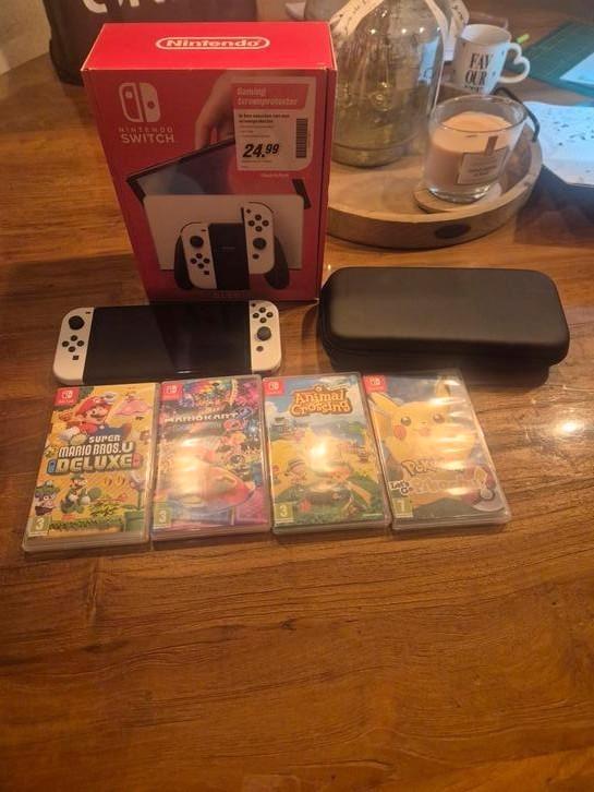 Nitendo switch oled Zo goed als nieuw., Spelcomputers en Games, Spelcomputers | Nintendo Switch, Zo goed als nieuw, Switch Original