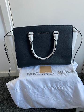 Zwart witte handtas Michael Kors beschikbaar voor biedingen