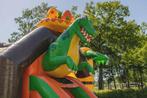Springkussen Dino met Glijbaan - Feestverhuur, Ophalen of Verzenden, Zo goed als nieuw