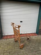 Antieke koffer transportwagen, Ophalen