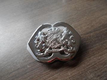 Baretembleem Korps Nationale Reserve KL beschikbaar voor biedingen