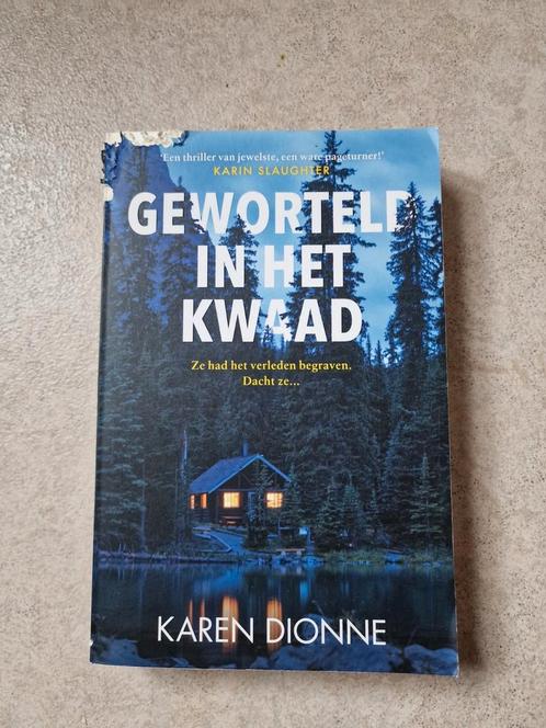 Karen Dionne - Geworteld in het kwaad, Boeken, Thrillers, Zo goed als nieuw, Nederland, Ophalen of Verzenden