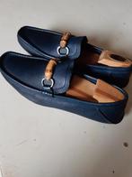 Gucci 8G (42), Ophalen of Verzenden, Gedragen, Blauw