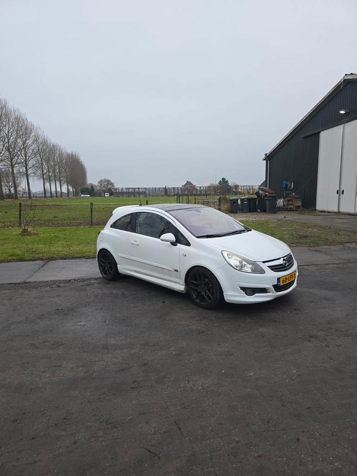 Opel Corsa 1.4 16V 3D 2010 Wit, Auto's, Opel, Particulier, Corsa, Achteruitrijcamera, Airbags, Airconditioning, Bluetooth, Bochtverlichting