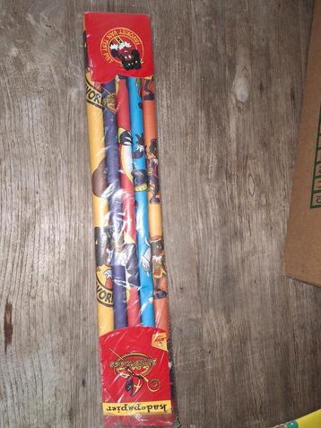 Kado papier club van Sinterklaas met zwarte piet erop beschikbaar voor biedingen