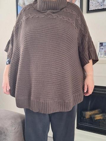 Mooie poncho maat 60/62 (valt als 56) beschikbaar voor biedingen