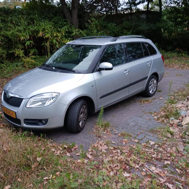 Skoda Fabia 1.4 16V 63KW Combi 2010 Grijs (Gas en Benzine), Auto's, Skoda, Particulier, Fabia, Airbags, Airconditioning, Centrale vergrendeling