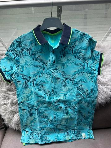 Groen/blauwe polo van de WE beschikbaar voor biedingen