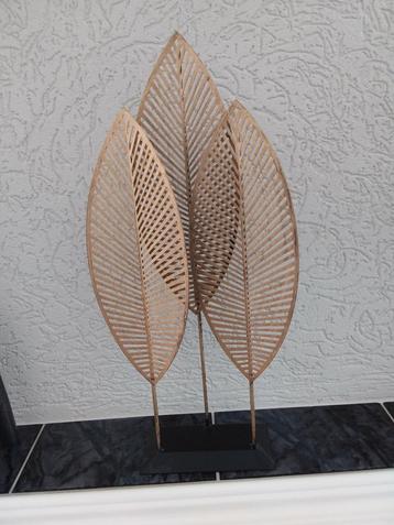 Metalen "veren" beschikbaar voor biedingen