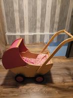 Poppen wagen van hout, Ophalen