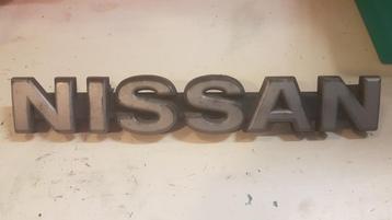 Nissan katrol badge logo beschikbaar voor biedingen