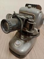 Dia-projector Noris, Ophalen