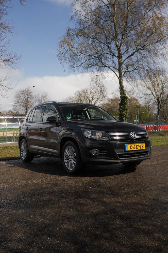 Volkswagen Tiguan 1.4 TSI 118KW BMT 2014 Zwart, Auto's, Voorwielaandrijving, 15 km/l, 1800 kg, 4 cilinders