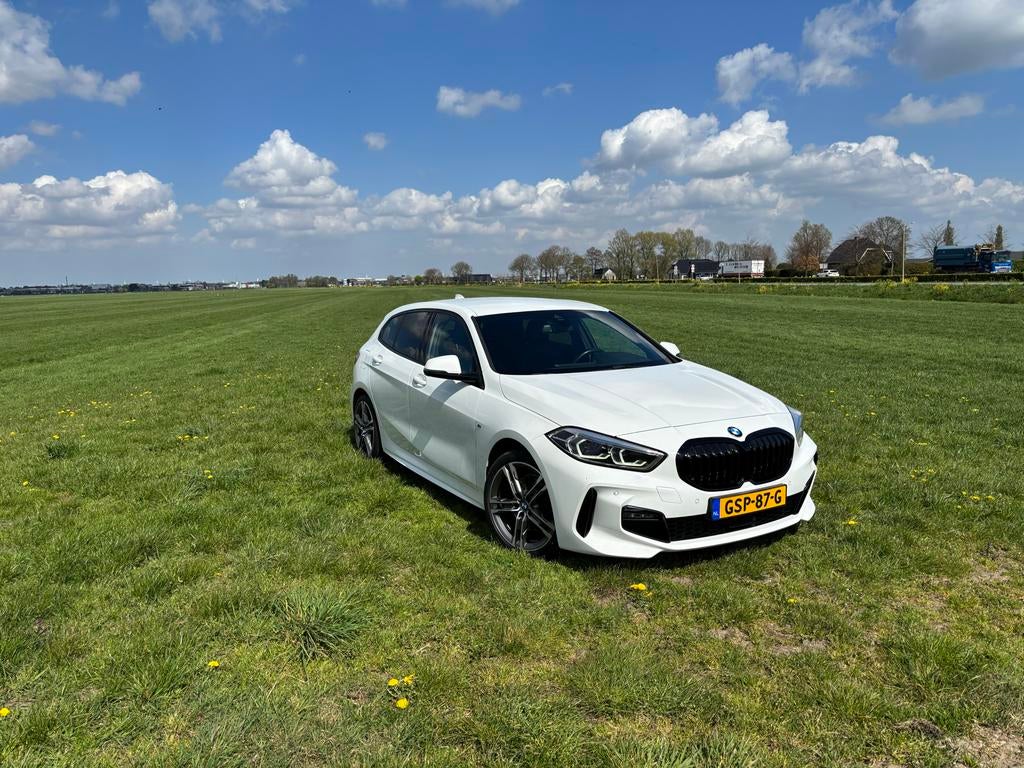 BMW 1-Serie 118i 140pk Aut 2019 Wit, Auto's, BMW, 1-Serie, Benzine, Hatchback, Automaat, Geïmporteerd, Wit, Voorwielaandrijving