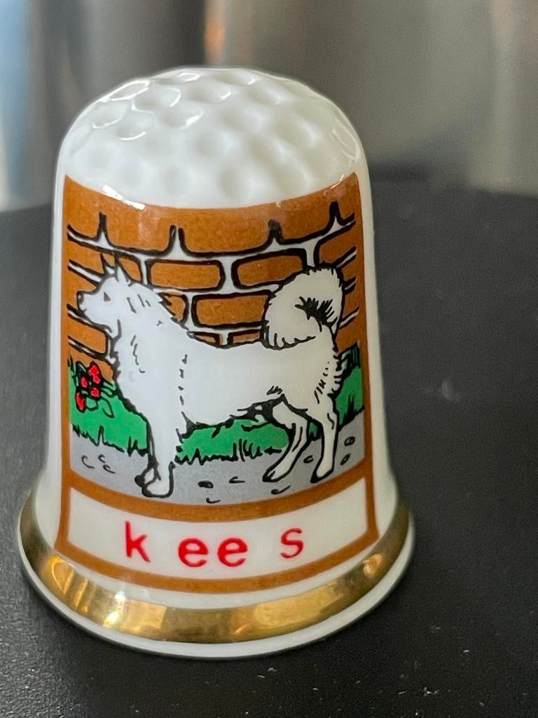 Vingerhoedje met Keeshond afbeelding, Ophalen, Gebruikt