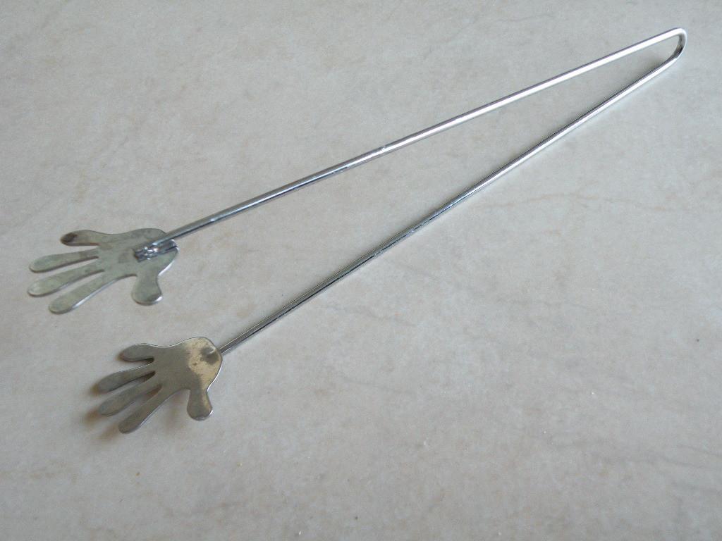 Tang om waxinelichtjes uit een windlicht te pakken., Ophalen of Verzenden, Nieuw, Metaal, Minder dan 25 cm