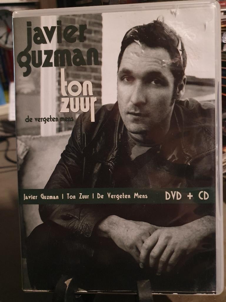 Dvd + Cd Javier Guzman - Ton Zuur - De Vergeten Mens, Alle leeftijden, Ophalen, Zo goed als nieuw, Stand-up of Theatershow