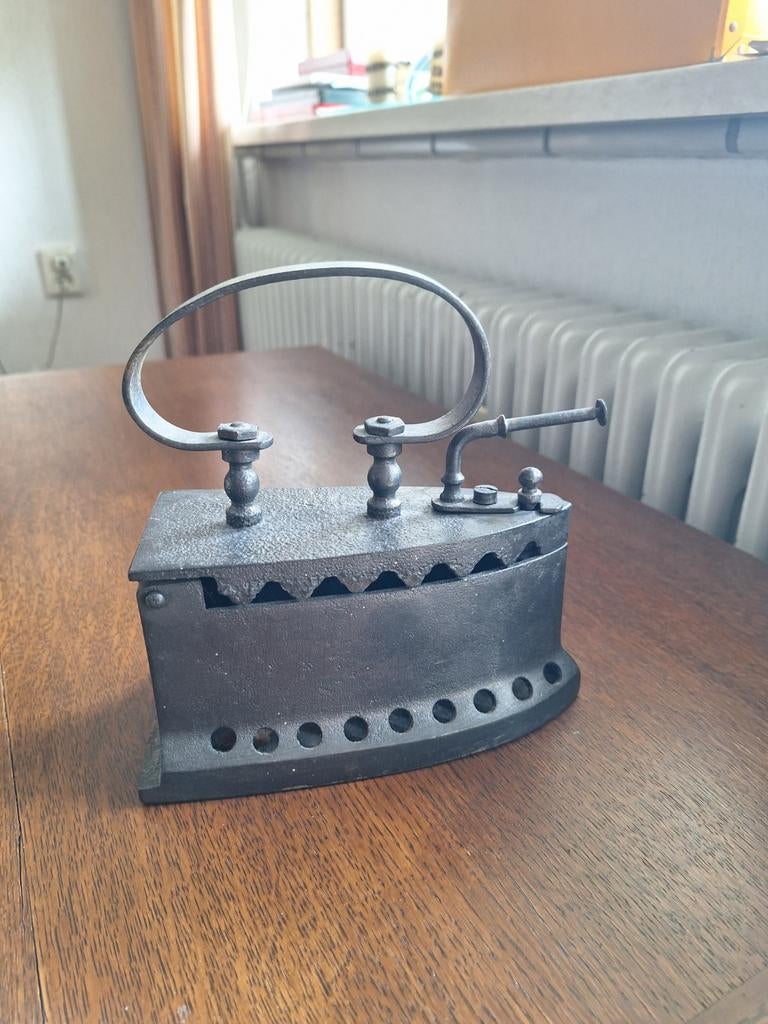Antiek strijkijzer, Ophalen