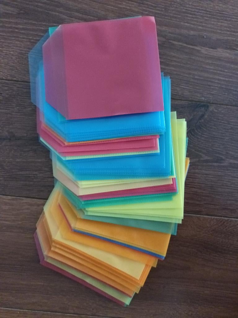 72 plastic CD DVD hoesjes sleeves gekleurd nieuw nieuwe, Ophalen of Verzenden, Nieuw