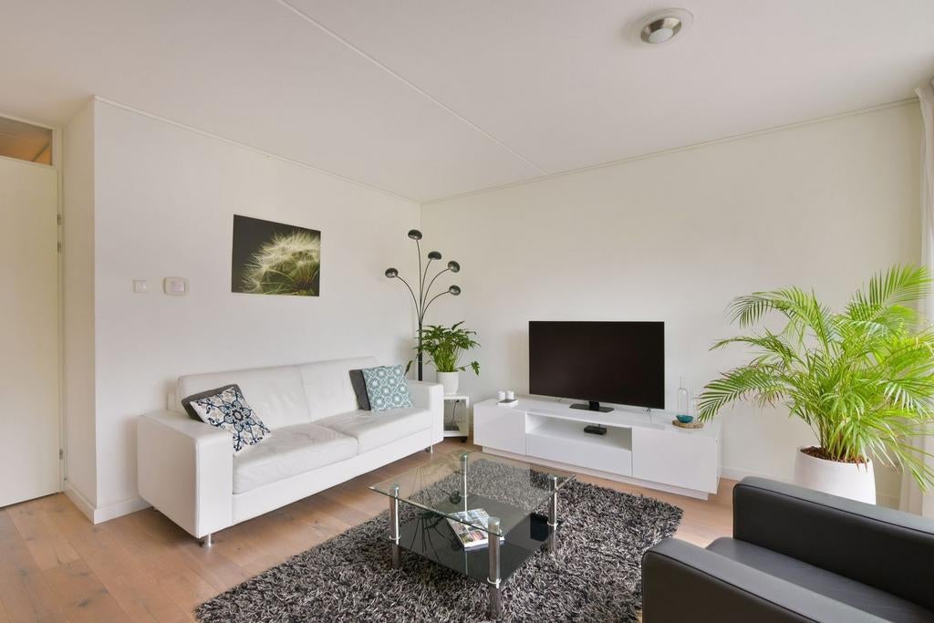 Glazen salontafel met chromen poten, Huis en Inrichting, Tafels | Salontafels, Ophalen