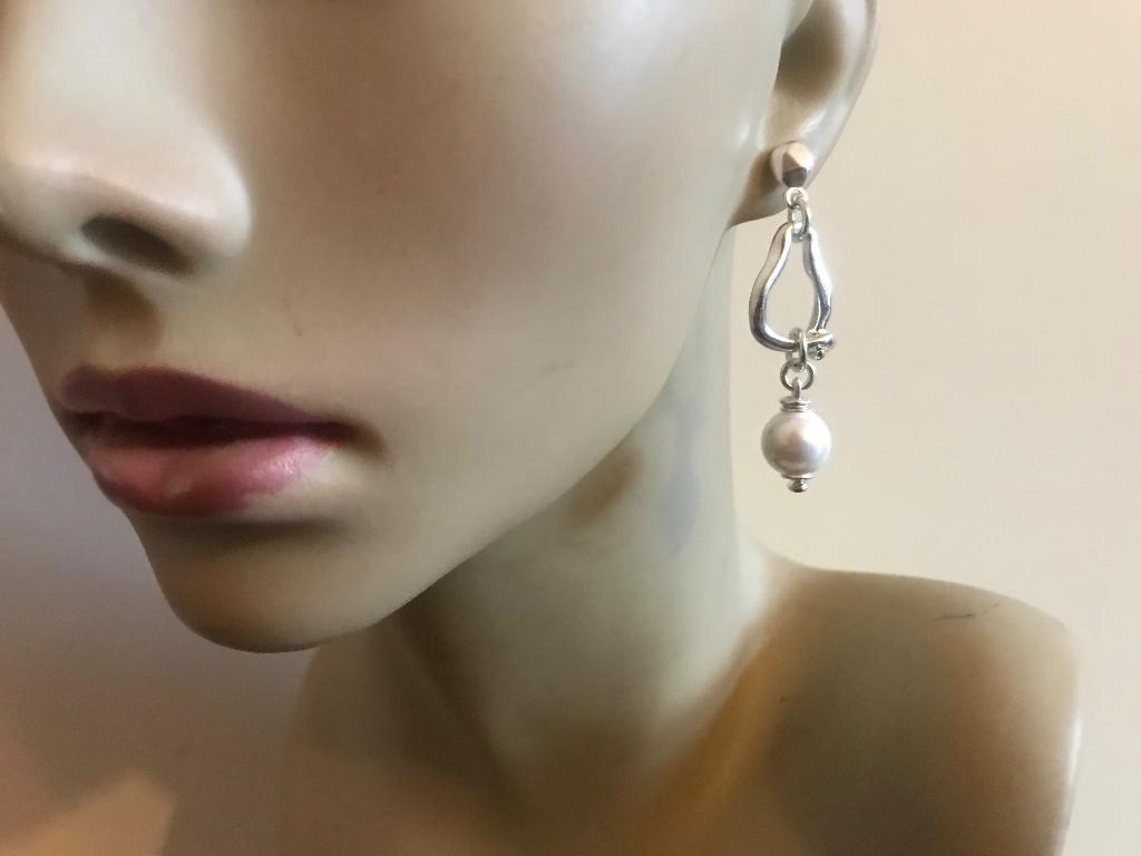 Uno de 50 oorbellen (52+) (125,- = 42,50) Man Ojo Pearl, Sieraden, Tassen en Uiterlijk, Oorbellen, Overige materialen, Nieuw, Ophalen of Verzenden