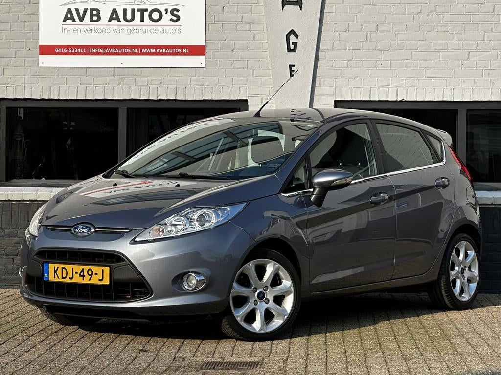 Ford Fiesta 1.25 Titanium Clima Spoiler Stoelverwarming, Voorwielaandrijving, Stof, Gebruikt, 82 pk