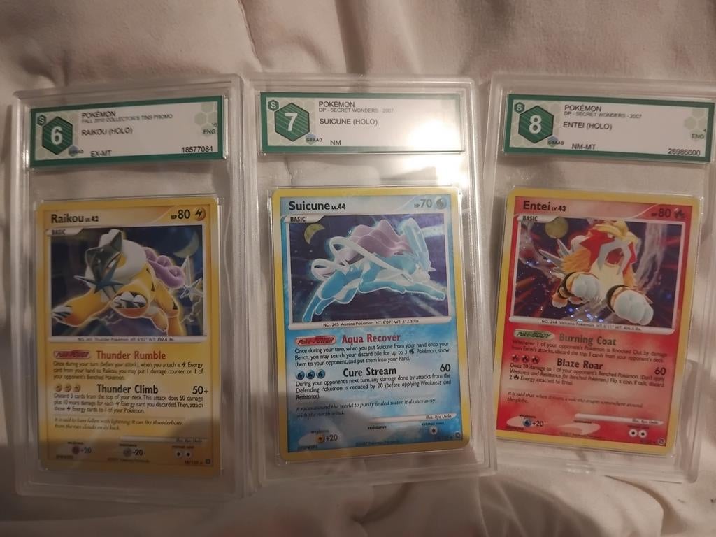 Pokémon Kaarten 2007 Raikou, Suicune, Entei graad Graded, Ophalen of Verzenden, Zo goed als nieuw, Meerdere kaarten, Foil
