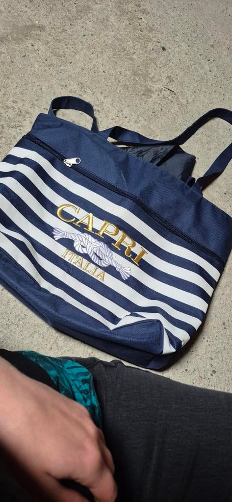 Schoudertas, Ophalen