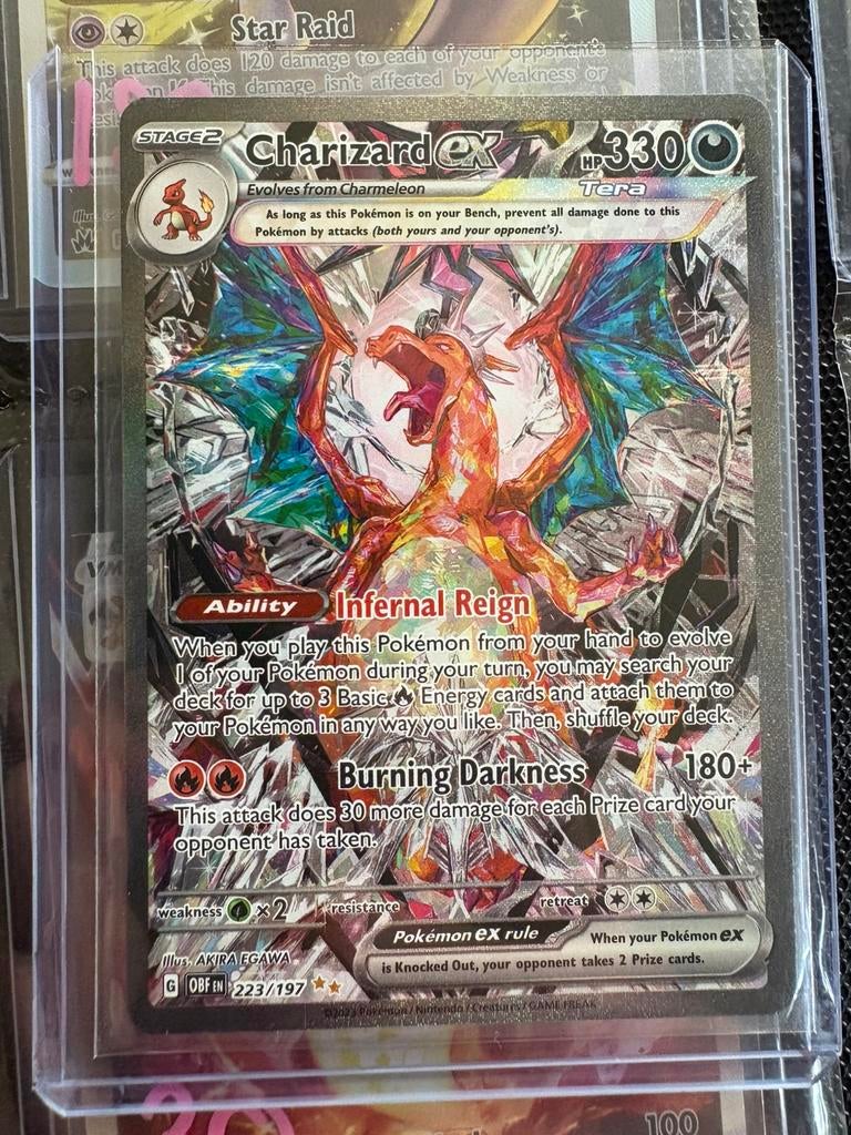 Pokemon kaart Charizard 223, Ophalen, Zo goed als nieuw