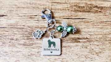 Sleutelhanger Bernedoodle RVS met beschermengeltje beschikbaar voor biedingen