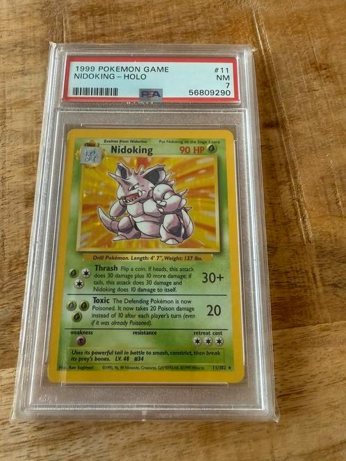 Pokemon Nidoking Holo Base Set PSA 7, Hobby en Vrije tijd, Verzamelkaartspellen | Pokémon, Zo goed als nieuw, Ophalen of Verzenden