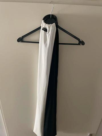 MOQ riemen zwart en wit - Stijlvol Accessoire beschikbaar voor biedingen