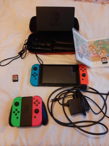 Nintendo Switch 4 Controllers 2 Games beschikbaar voor biedingen