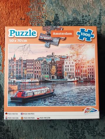 Grafix puzzel. Gracht in Amsterdam. Rondvaartboot 1000 stukj beschikbaar voor biedingen