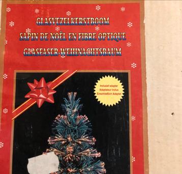 Kerstboom met glasvezel lichtjes beschikbaar voor biedingen