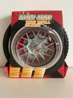 AUTOBAND WANDKLOK NIEUW 26 cm doorsnee, Ophalen of Verzenden, Nieuw, Wandklok