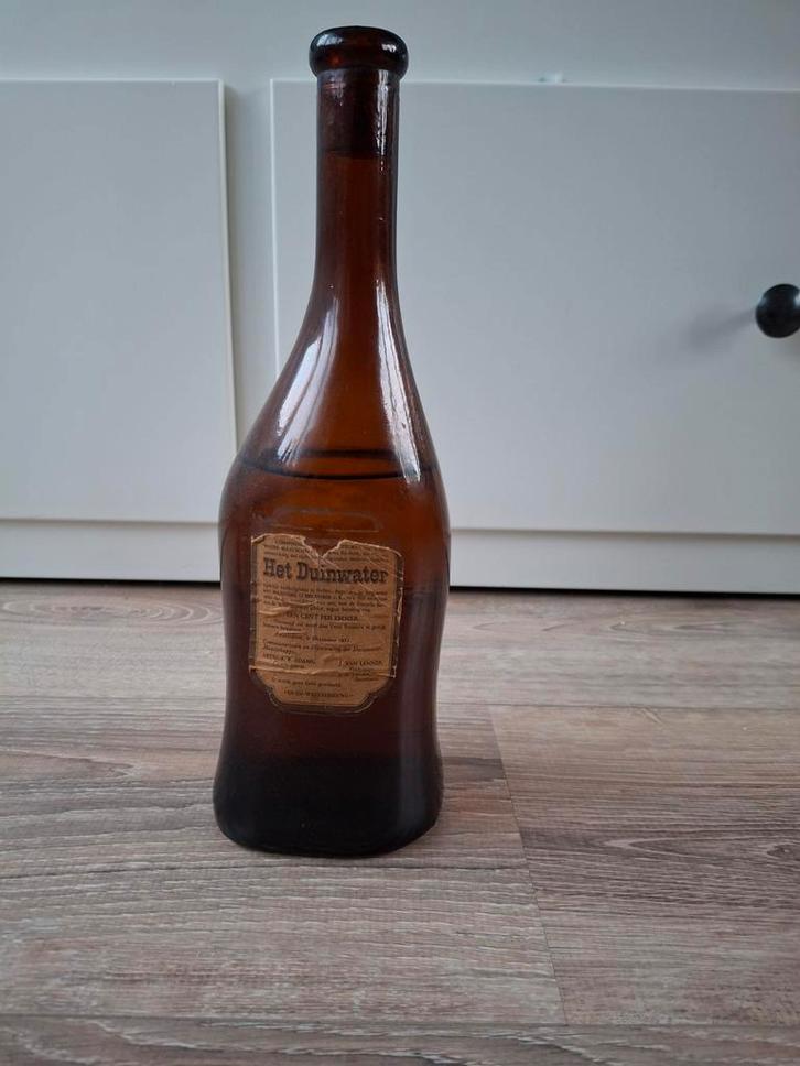 Antieke 'Het Duinwater' Fles ter ere van 700 jaar Amsterdam, Antiek en Kunst, Antiek | Glas en Kristal, Ophalen