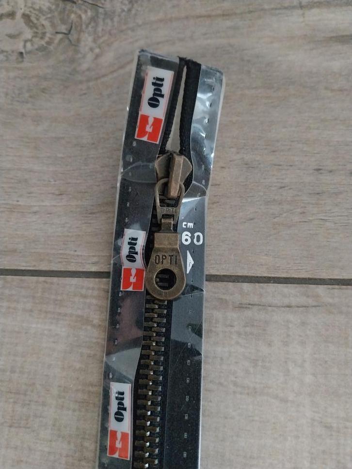 Opti M60 deelbare rits 60 cm metaal brons zwart NIEUW, Hobby en Vrije tijd, Naaien en Fournituren, Nieuw, Rits of Sluiting, Ophalen of Verzenden
