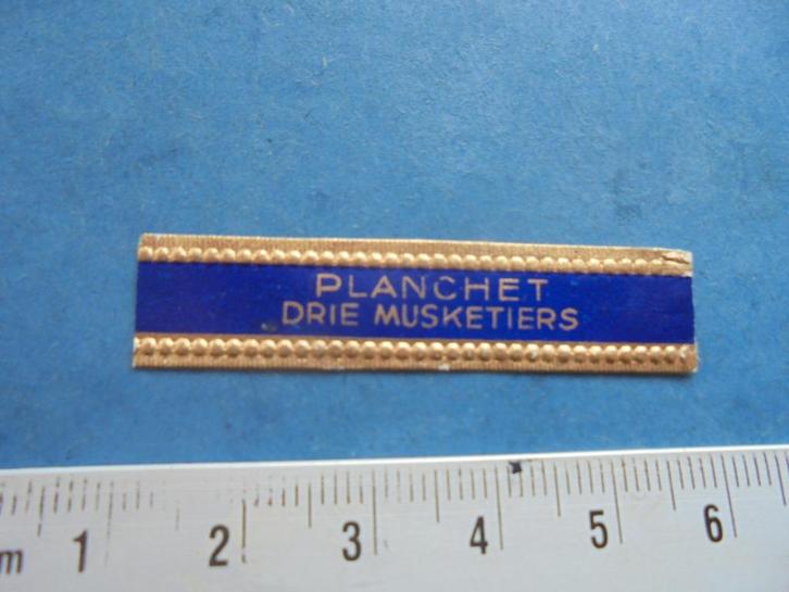 Oude sigarenband Planchet Drie Musketiers, Verzamelen, Rookartikelen, Aanstekers en Luciferdoosjes, Zo goed als nieuw, Sigarenbandjes