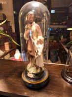 Antieke stolp met St Joseph, Ophalen