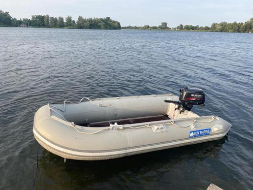 Rubberboot inclusief motor, Watersport en Boten, Rubberboten, Gebruikt, Overige merken, Hout, Minder dan 70 pk, Benzine, Ophalen