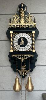 Unieke zwarte Zaanse klok, Ophalen