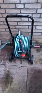 Tuinslanghaspel met slang, Ophalen