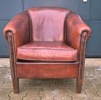 Schapenleren club fauteuil, Ophalen