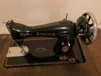 Antieke Singer trapnaaimachine, Ophalen