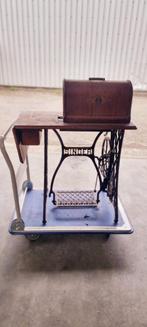 Oude Singer naaimachine, Ophalen